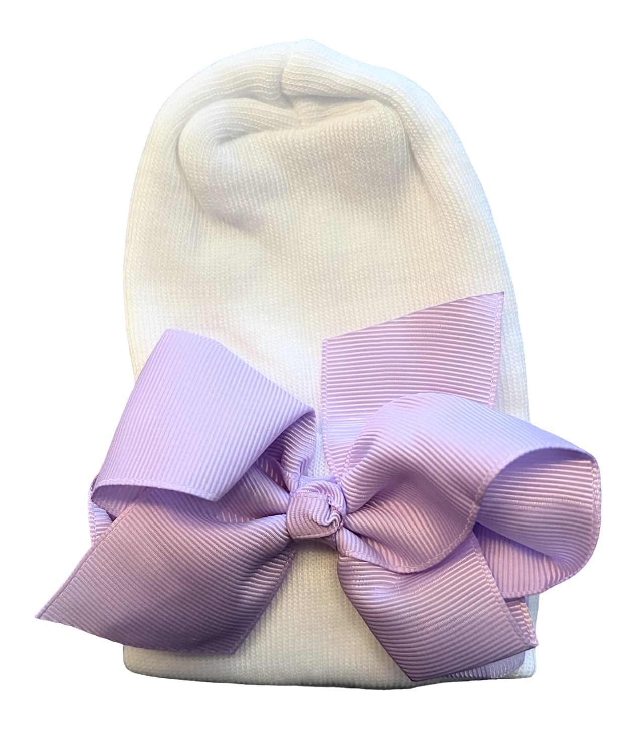 Neugeborenenmütze mit lila Schleife extra warm