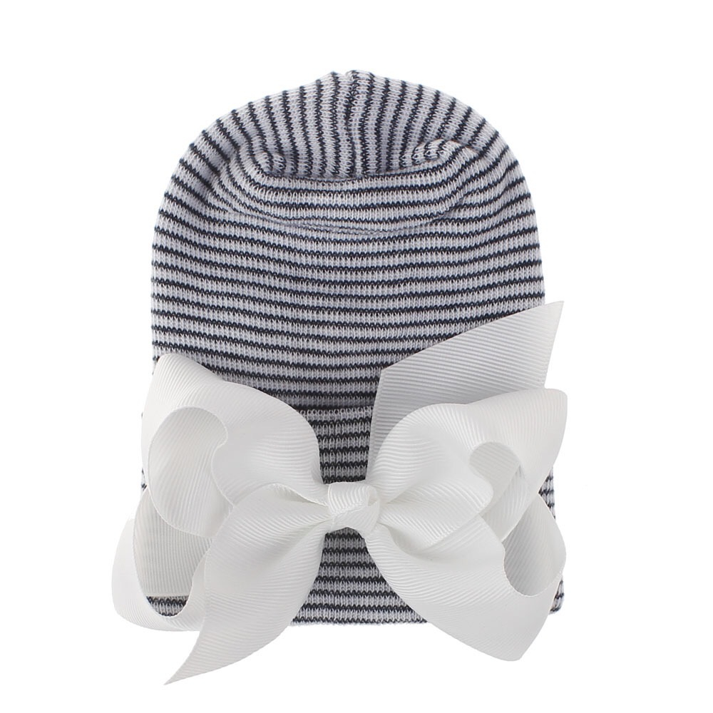Babymütze schwarz und weiß mit weißer Schleife extra warm